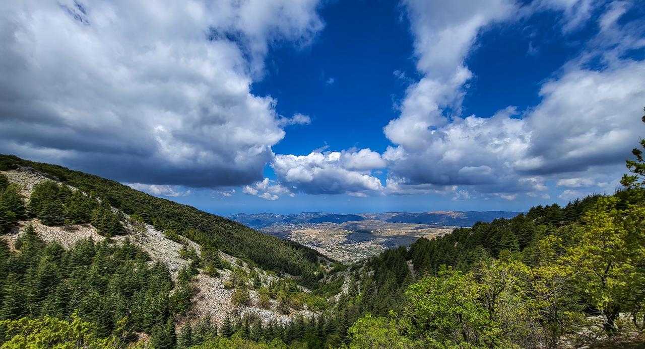 A view of the Jabal Moussa Biosphere Reserve on the western slopes of Mount Lebanon, overlooking the Mediterranean Sea to the west. The biosphere hosts Roman rock carvings dating back to the 2nd century A.D.; an Ottoman settlement with a water mill, farms, and an olive press; and a Byzantine church that includes a mosaic. The area is home to as many as 727 flora species (26 are endemic to Lebanon) and more than 137 bird species.