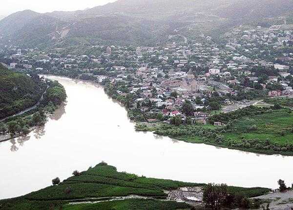 A panoramic view of Mtskheta, Georgia, from the Jvari Monastery. The town, which lies at the confluence of the Mtkvari (Kura) and Aragvi rivers, served as the capital of the Georgian Kingdom of Iberia from the 3rd century B.C. to the 5th century A.D. The capital was moved to Tbilisi in the early 6th century, but Mtskheta continued to serve as the coronation and burial place for most Georgian kings until the 19th century.