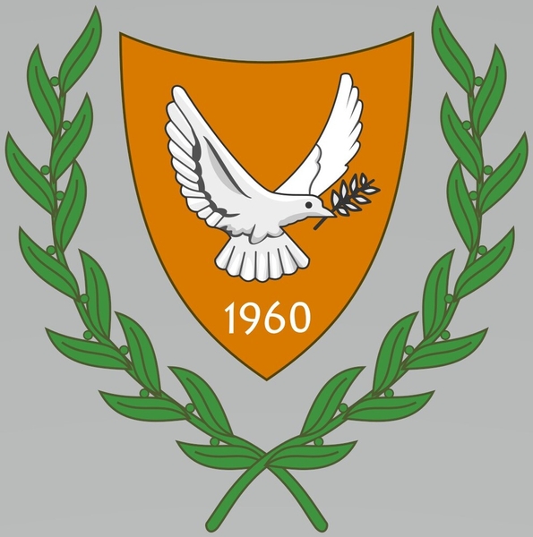 The coat of arms of Cyprus features a yellow shield representing the island’s copper deposits. A dove, one of the national symbols, holds an olive branch symbolizing peace, and olive branches encircle the shield. The year 1960 on the shield is the date of Cyprus’s independence from the United Kingdom.