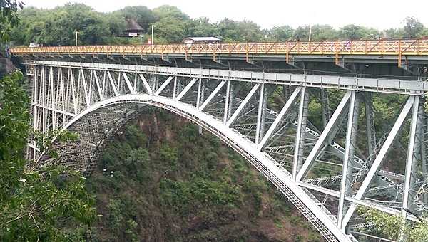 The Victoria Falls Bridge over the Zambezi River between Zimbabwe and Zambia.